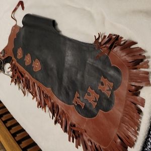 Custom chaps, no manufacturer ID on them.